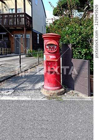 Red circle postbox in Nukuikitamachi, Koganei City, Tokyo 129945626