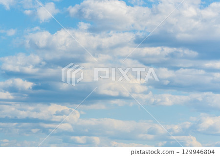 Blue sky background with white clouds. 129946804