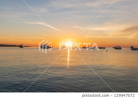 Sunrise over the sea. Panoramic seascape. Sunrise over the sea. Panoramic seascape. 129947072