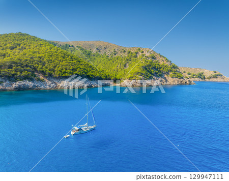 Sea transport. Drone view on the yacht. Summer vacation in the Mediterranean. Mallorca, Spain. 129947111