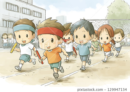 Children passing the baton in a relay race at a sports day 129947134