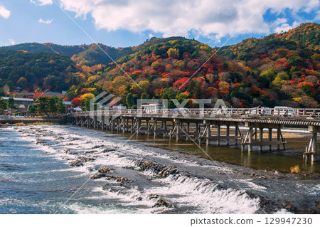 Togetsukyo bridge with colorful autumn leaf on mountain, Arashiyama Togetsukyo bridge with colorful autumn leaf on mountain, Arashiyama 129947230