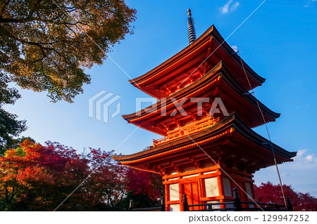 Kiyomizudera Pagoda against autumn foliage colors, Kyoto, Japan 129947252