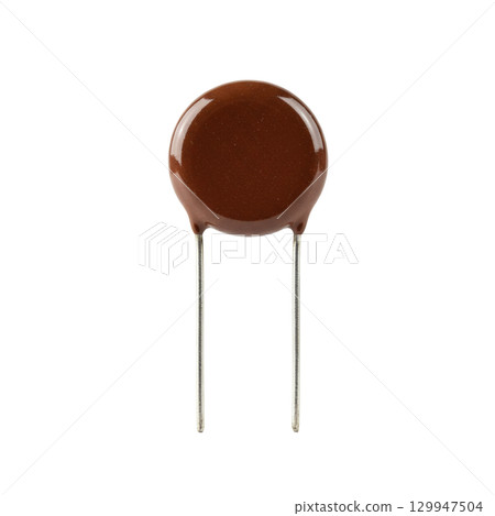 Brown ceramic disc capacitor electronic component with two wire leads for a printed circuit board Brown ceramic disc capacitor electronic component with two wire leads for a printed circuit board 129947504