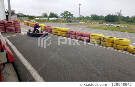 Go-kart track background outdoors 129948942