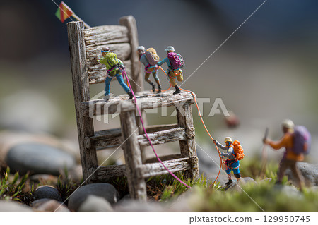 Rock climbing on a giant wooden chair (diorama) 129950745