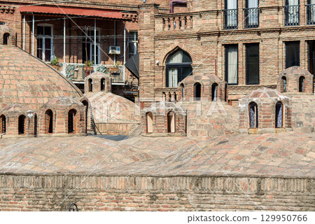 Thermal sulfur bathhouses in Abanotubani district in Old town of Tbilisi, Georgia Thermal sulfur bathhouses in Abanotubani district in Old town of Tbilisi, Georgia 129950766