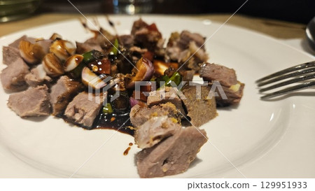 this is roast goat menu on a plate this is roast goat menu on a plate 129951933