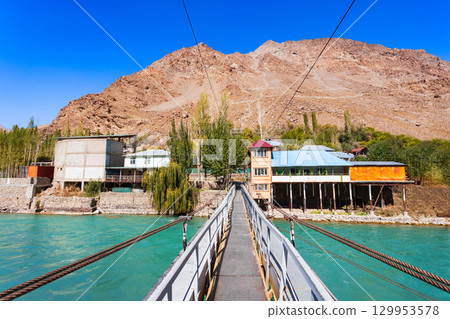 Ghunt river in Khorog city and Pamir mountains, Tajikistan 129953578