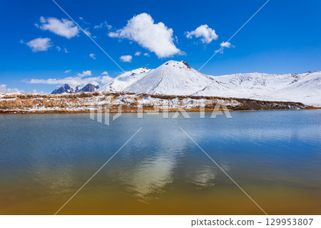 Shorkul lake and Pamir mountains near Murghab town, Tajikistan Shorkul lake and Pamir mountains near Murghab town, Tajikistan 129953807