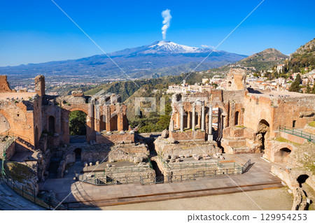 Taormina Ancient Theatre, Etna volcano aerial view, Sicily 129954253