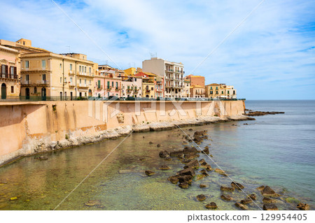Coast in the centre of Syracuse city, Sicily 129954405
