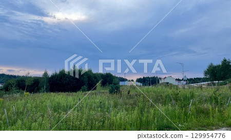 Evening view of a field and the horizon Evening view of a field and the horizon 129954776