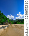 Summer scenery of Ishigaki Island's Crystal Beach, a white sand beach with a stream running through it 129955210