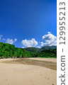 Summer scenery of Ishigaki Island's Crystal Beach, a white sand beach with a stream running through it 129955213