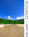 Summer scenery of Ishigaki Island's Crystal Beach, a white sand beach with a stream running through it 129955216