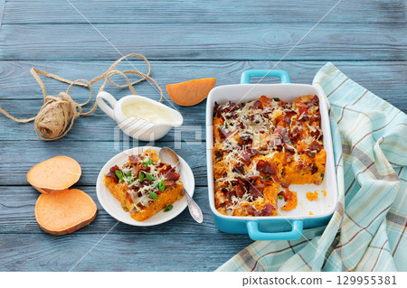 sweet potato casserole with bacon, cheese, onion sweet potato casserole with bacon, cheese, onion 129955381