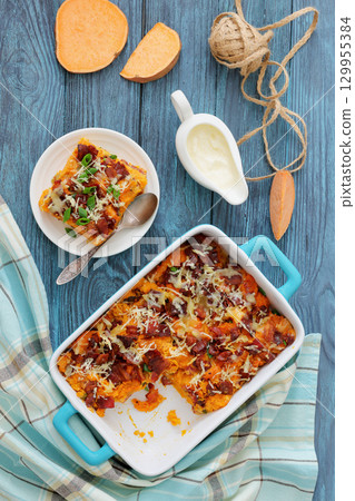 sweet potato casserole with bacon, cheese, onion sweet potato casserole with bacon, cheese, onion 129955384