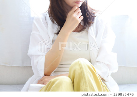 A woman with trouble A woman with trouble 129955476