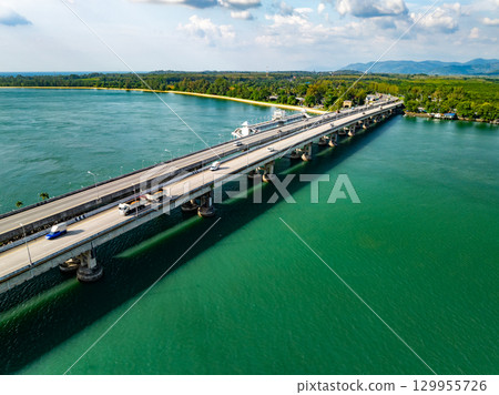 Aerial view of Sarasin bridge road transportation background concept The bridge is a between Phang Nga and Phuket island Thailand The bridge is the most important in making business and transportation Aerial view of Sarasin bridge road transportation background concept The bridge is a between Phang Nga and Phuket island Thailand The bridge is the most important in making business and transportation 129955726