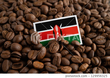 Kenya flag with shopping cart box on coffee beans, shopping online for imxport xmport. Kenya flag with shopping cart box on coffee beans, shopping online for imxport xmport. 129956325
