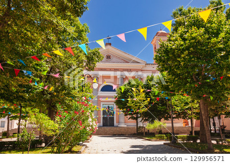 Cattedrale di Santa Maria della Neve in Nuoro in Sardinia decorated with colorful flags during summer religious celebration 129956571