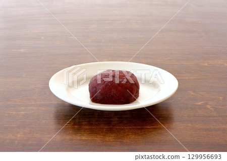 Ohagi served on a white plate on the table background Ohagi served on a white plate on the table background 129956693