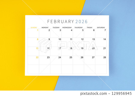 February 2026 calendar page on yellow and blue color background. 129956945