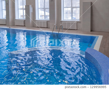 Modern luxury indoor pool, year-round resort and hotel concept 129956995