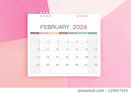 February month desk calendar for 2026 year on paper colorful background. 129957103