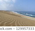 beautiful sandy beach and blue sea beautiful sandy beach and blue sea 129957333