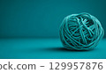 Turquoise yarn ball on smooth surface. Neural network AI generated 129957876