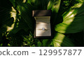 Diamond ring in box amidst green foliage. Neural network AI generated 129957877