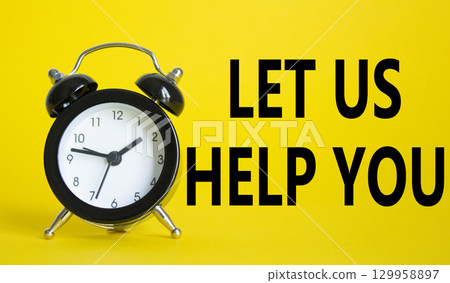 Let us help you symbol. Beautiful yellow background with alarm clock. Business and Let us help you concept. Copy space. 129958897