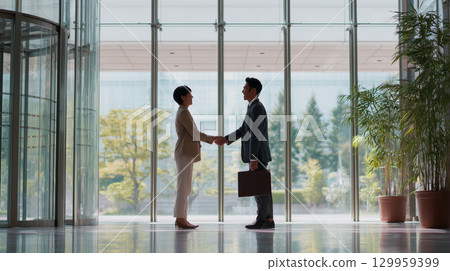 Business partnership handshake 129959399