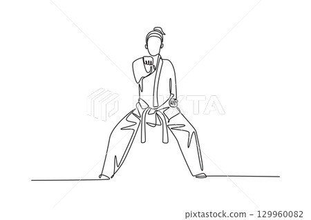 Single continuous line drawing female karate athlete in strong low stance. Symbolizing power, discipline, and the self-defense aspect of martial arts. One line draw graphic design vector illustration 129960082