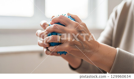 Seniors undergoing rehabilitation through occupational therapy Seniors undergoing rehabilitation through occupational therapy 129960634