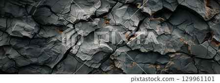 Textured rock surface spanning wide view Textured rock surface spanning wide view 129961101