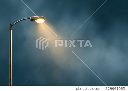 Street Light in Foggy Night 129961965