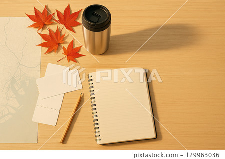 Autumn Travel Planning Flat Lay with Map, Maple Leaves and Copy Space 129963036