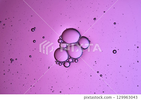 Beautiful bubbles in the texture of a cosmetic product close-up. Beautiful bubbles in the texture of a cosmetic product close-up. 129963043