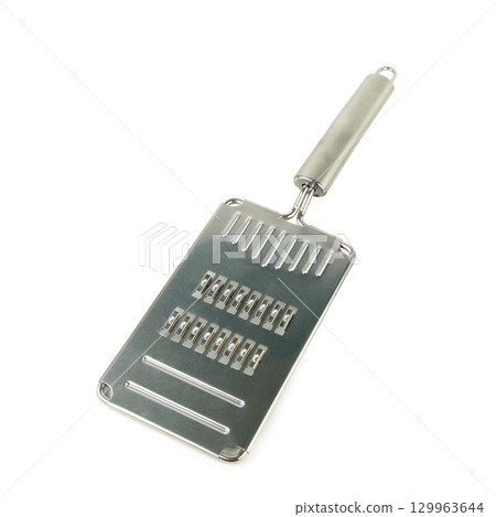 Stainless Steel Kitchen Grater isolated on white background. 129963644