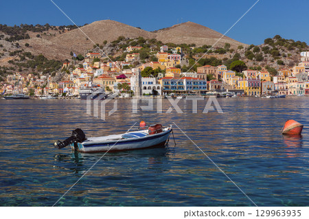 Small Boat in Harbor of Symi, Greece 129963935