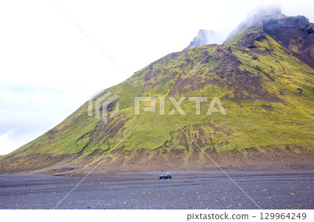 Scenic drive through the unique landscape of Iceland near a volcanic mountain 129964249