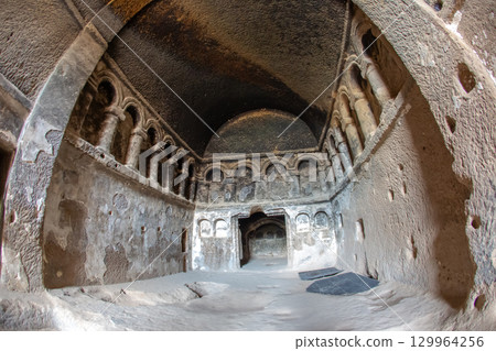 Exploring ancient rock-cut churches in Turkey from the cave monastery complex 129964256