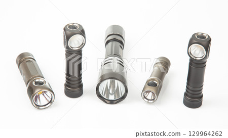 Diverse collection of flashlights showcasing different designs and features for various uses 129964262