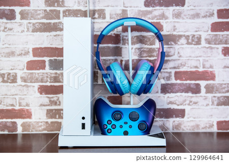 White gaming consoles the Xbox Series X and Xbox Series S. For play video games. 129964641