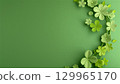 Green background with a wreath of green flowers, four leaf clover 3d illustration 129965170