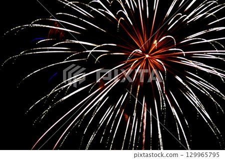 fireworks that draw a parabola 129965795