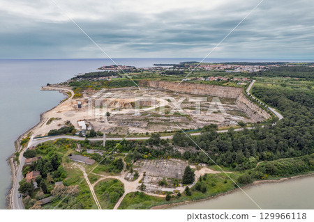 Aerial drone view of Novigrad coast and quarry. Istria, Croatia. 129966118